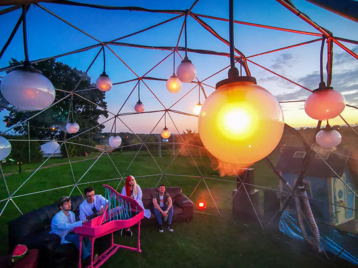 A group of people playing the Cloud Organ installation