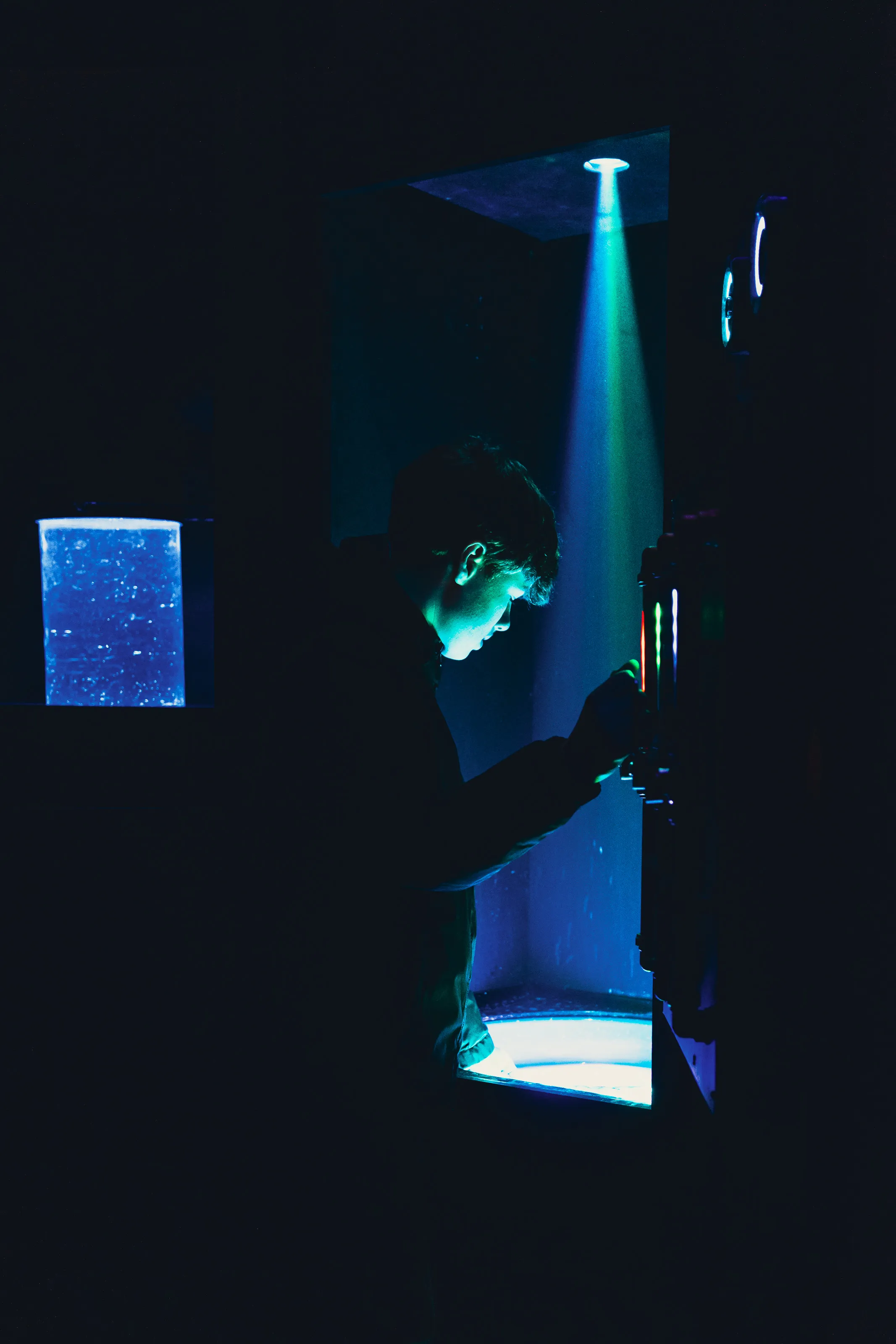 A child plays with interactive boiler room pipes